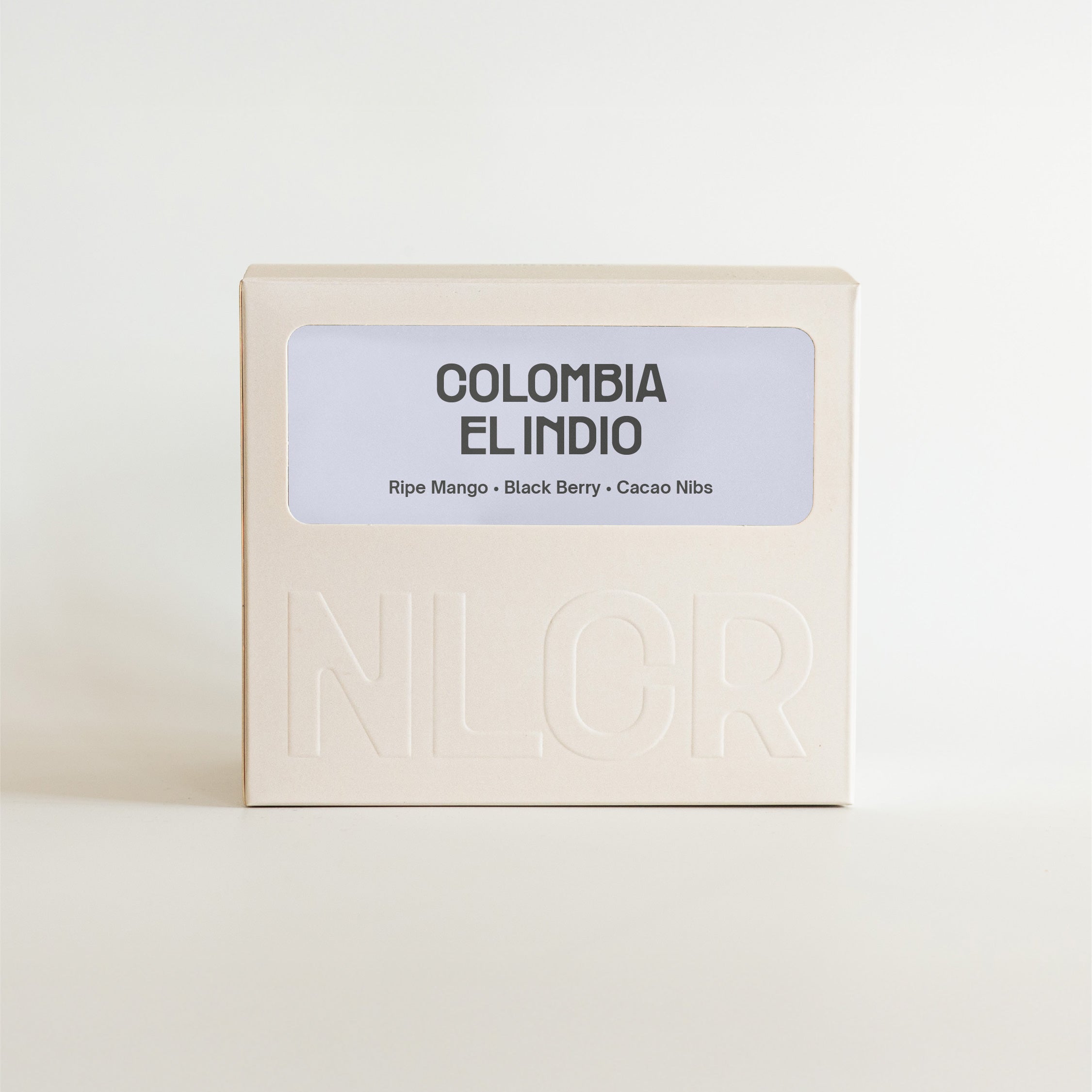 Box of Colombia El Indio coffee with 'NLCR' branding on a light background