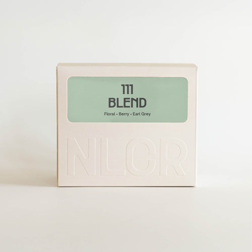 Box of 111 Blend tea with 'NLCR' branding on a white background
