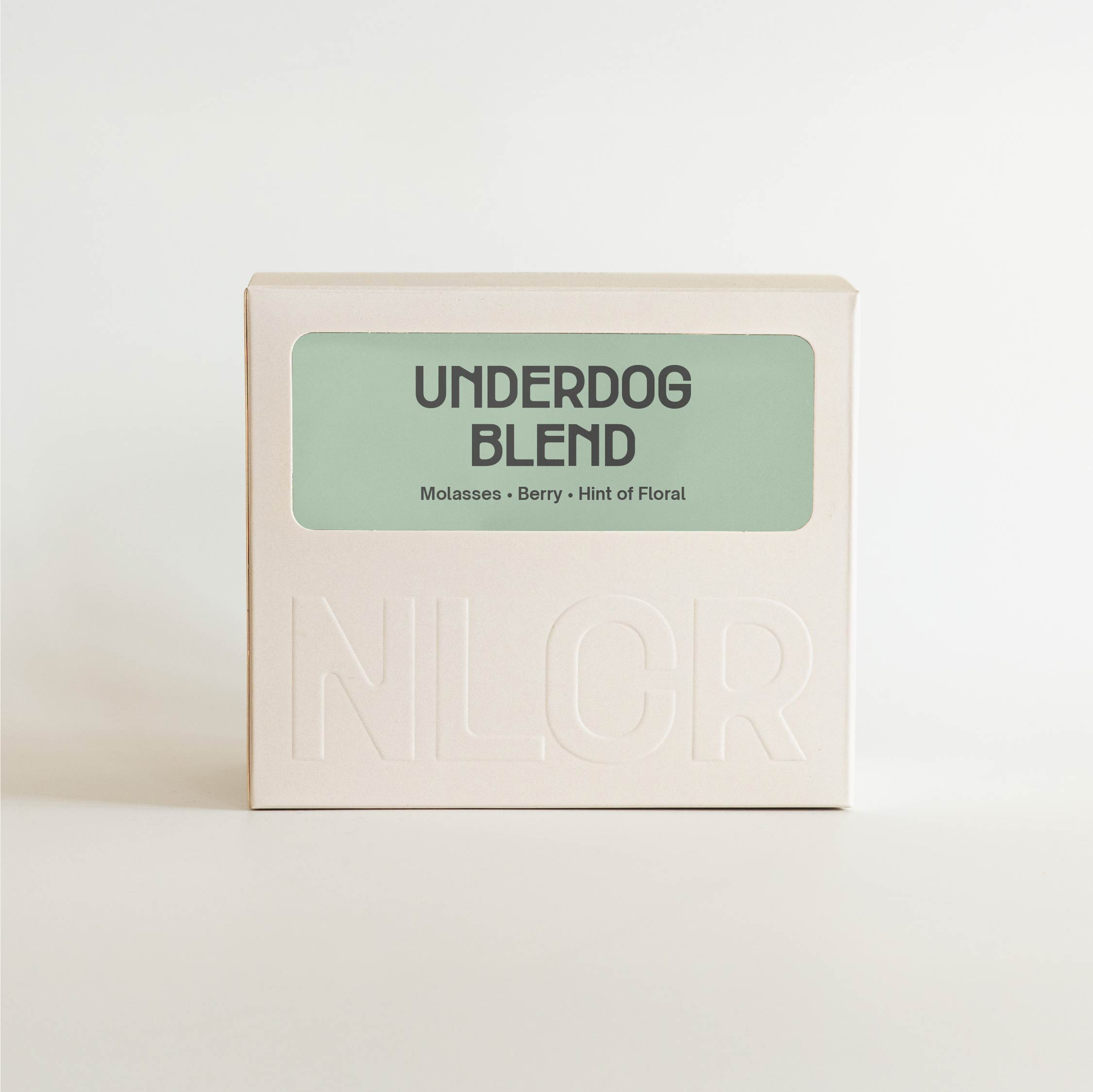 Box of Underdog Blend by Nine Lives Coffee Roasters on a white background