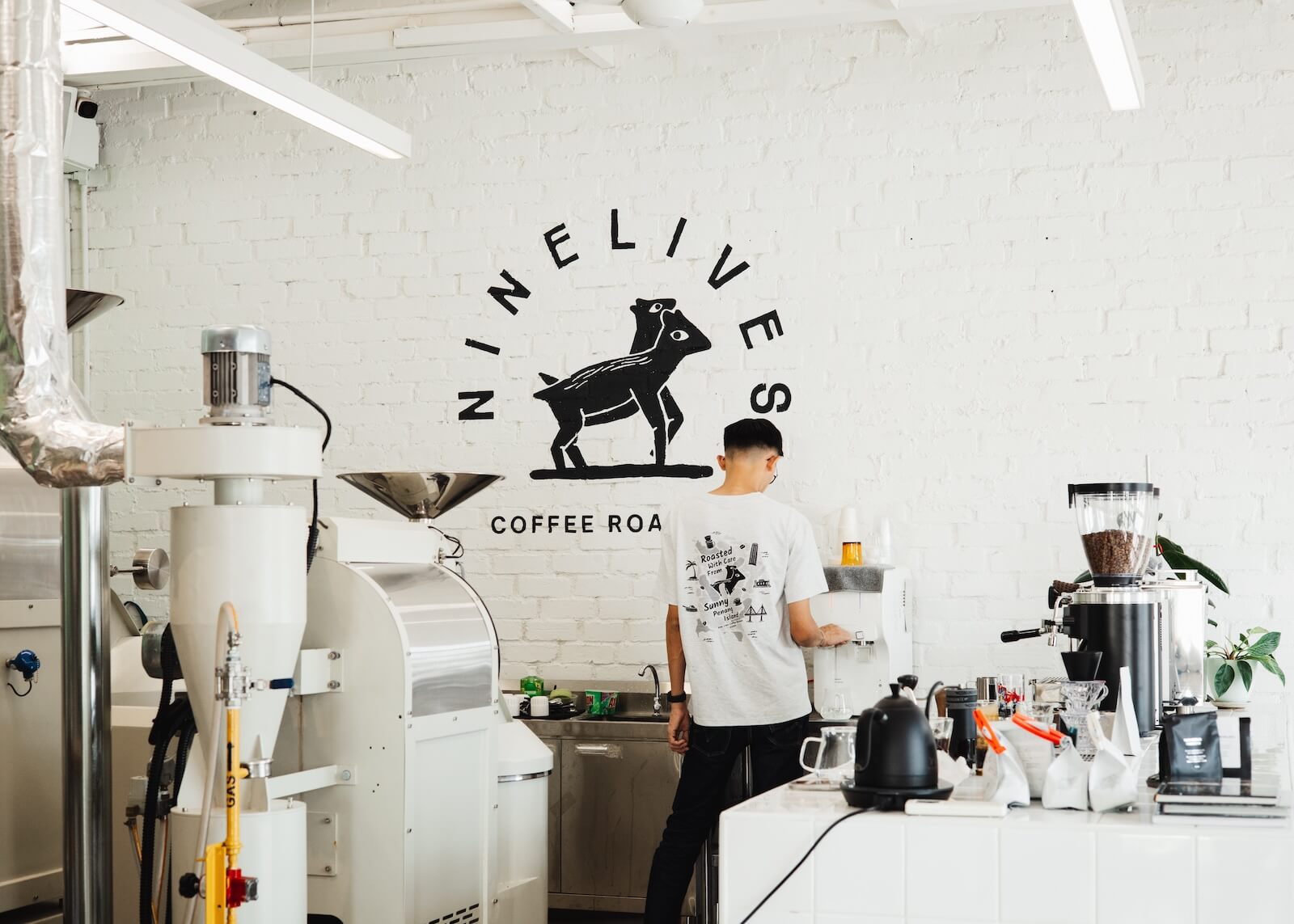Coffee roaster preparing for quality control at Nine Lives Coffee Roasters in Georgetown Penang